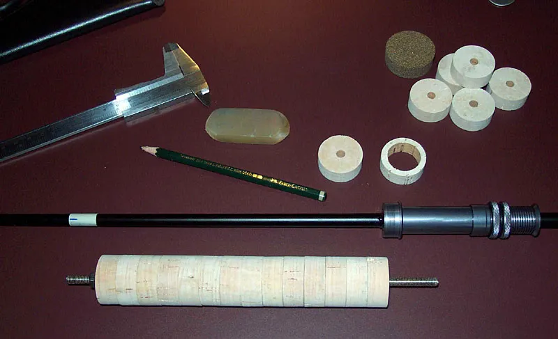 Preparations for cork handle installation - I always put the rings on a thread rod after I have assorted them qualitywise according to teh intended handle shape. Sometimes you can arrange cork in a way that you will remove cavities completely or leave them entirely closed to achieve the best possible surface.