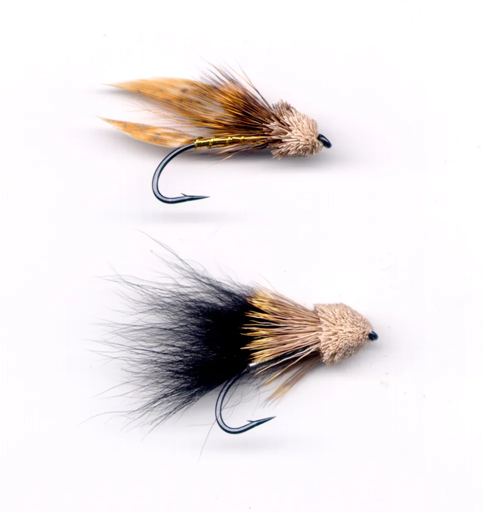 Neat muddlers - These muddlers are tied like I usually tie them: on top what can only be called an interpretation of Gapens Muddler Minnow, using the same basic materials, but a far cry from the Gapen fly, and below a <a href=\"/patterns/muddler/small.html\">Polar Muddler</a>, one of my favorite muddlers for sea run brown trout